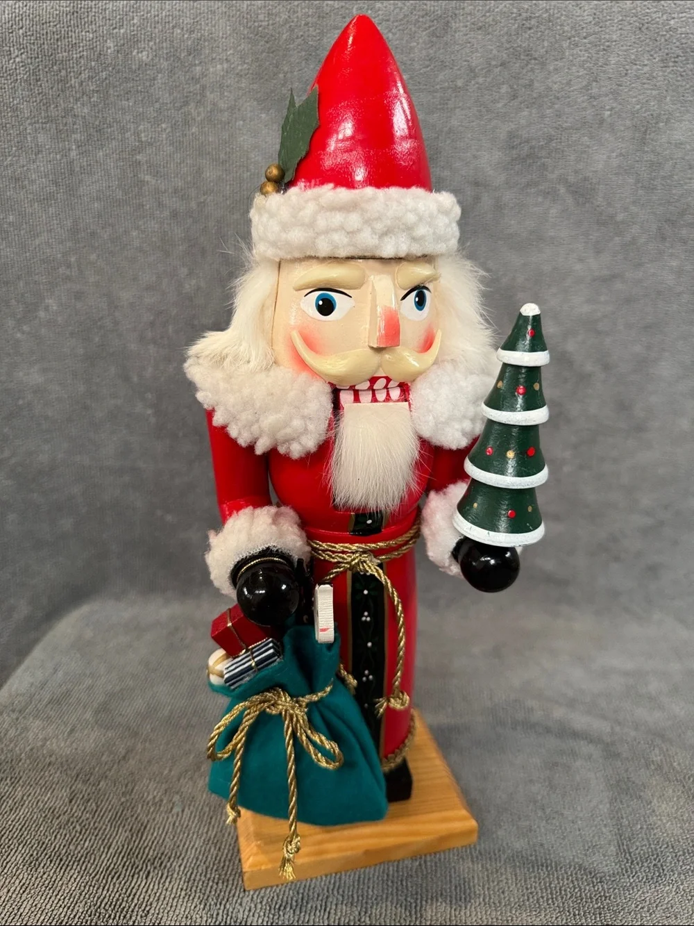 1990s 13.75 inch Santa Nutcracker with Green Tree and Sack of Toys Holiday Decor